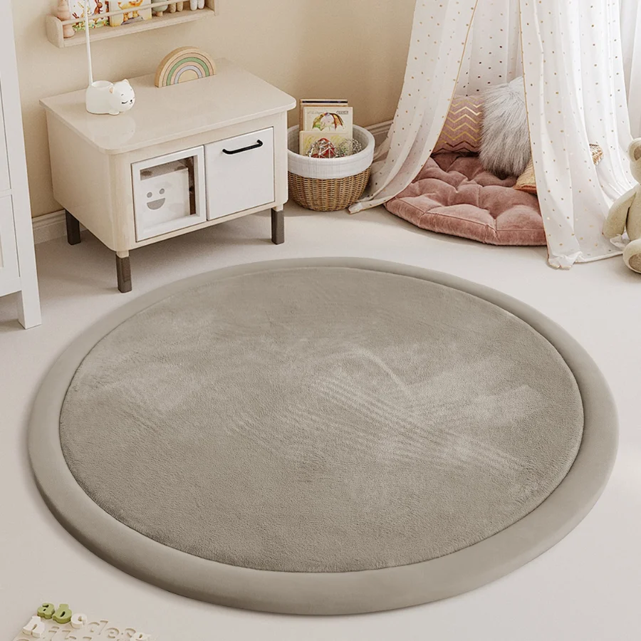 Rundt babytaeppe i beige