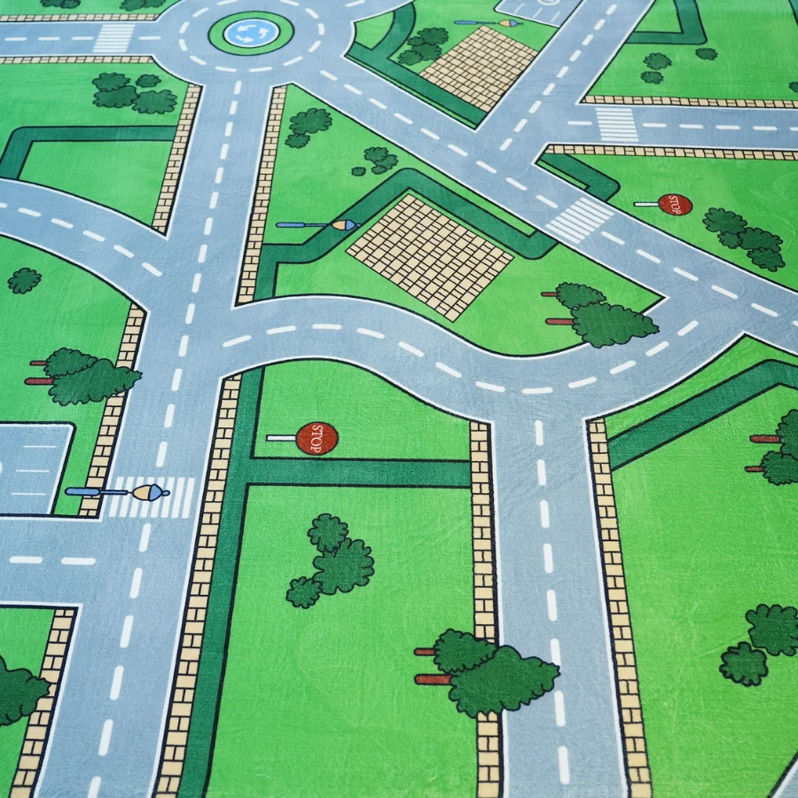 Stort babytaeppe med biler og veje