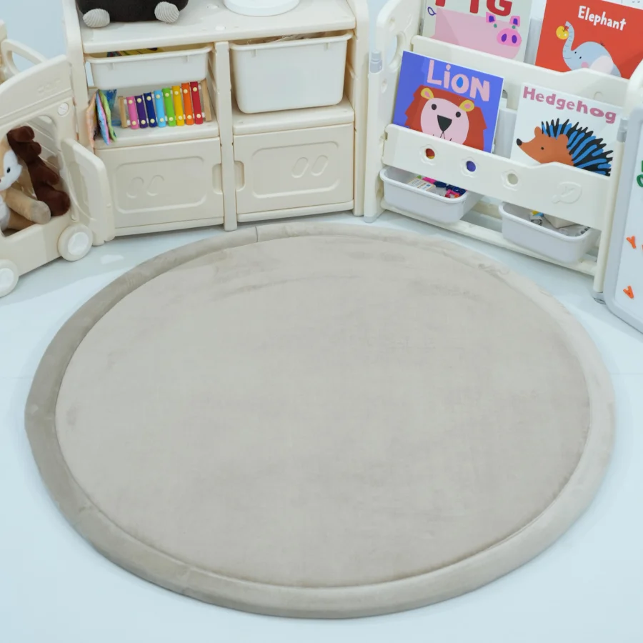 Rundt babytaeppe i beige fra BabyNordic